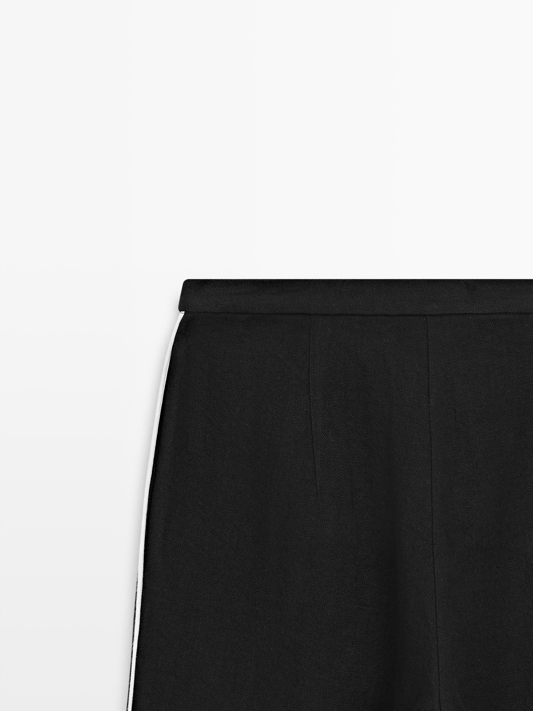 Linen trousers with contrast trim